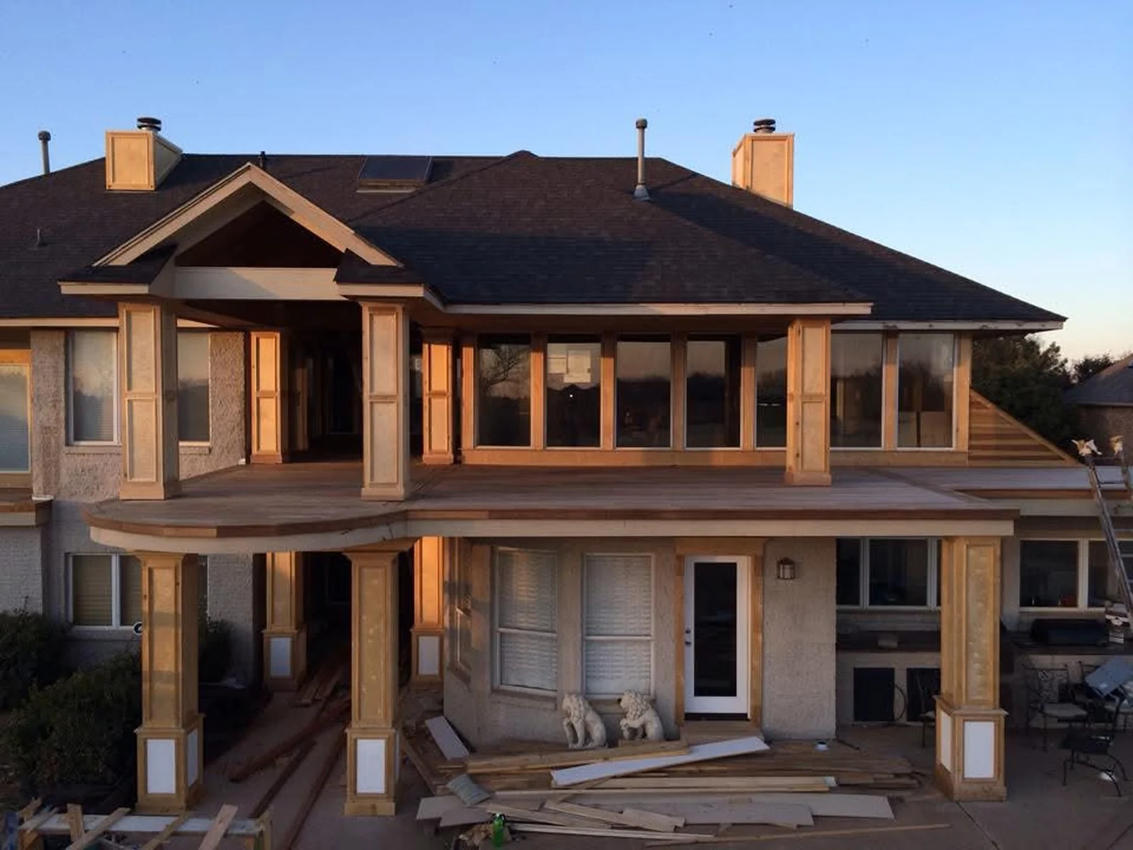 Second-story wooden deck construction in Norman by MASB Construction