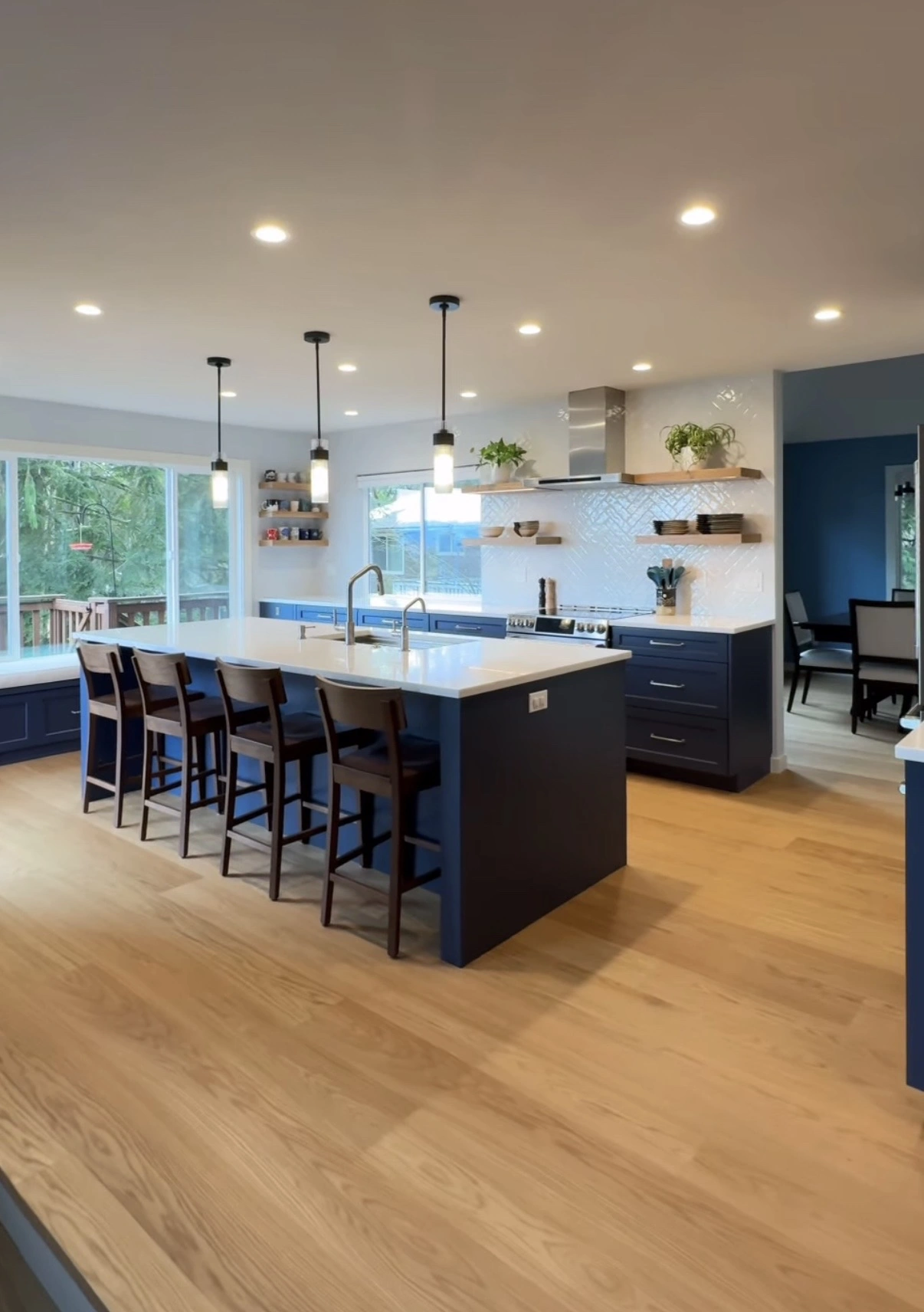 Contemporary kitchen finishes and improved layout in Midwest City by MASB Construction