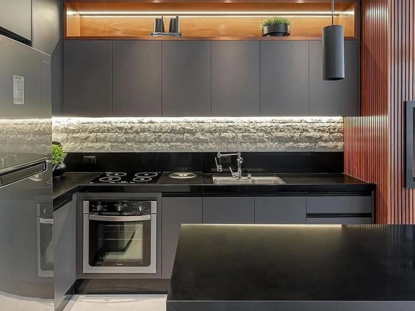 Custom cabinetry and stone countertops in an Edmond kitchen remodel by MASB Construction in the Oklahoma City metro