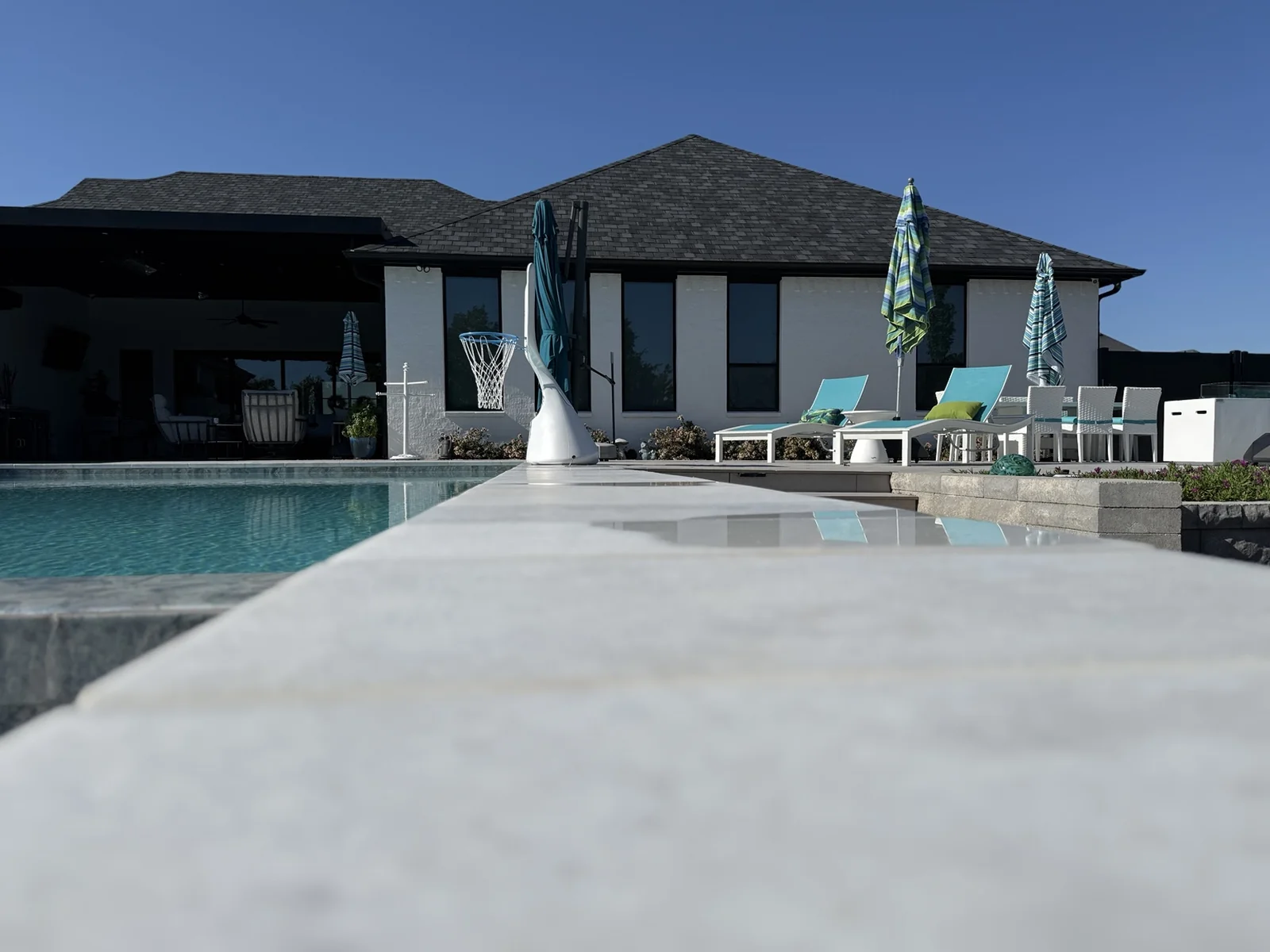 Luxury outdoor living and hardscape remodel in Edmond by MASB Construction