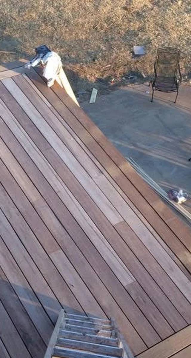 Wood deck installation detail in Norman by MASB Construction
