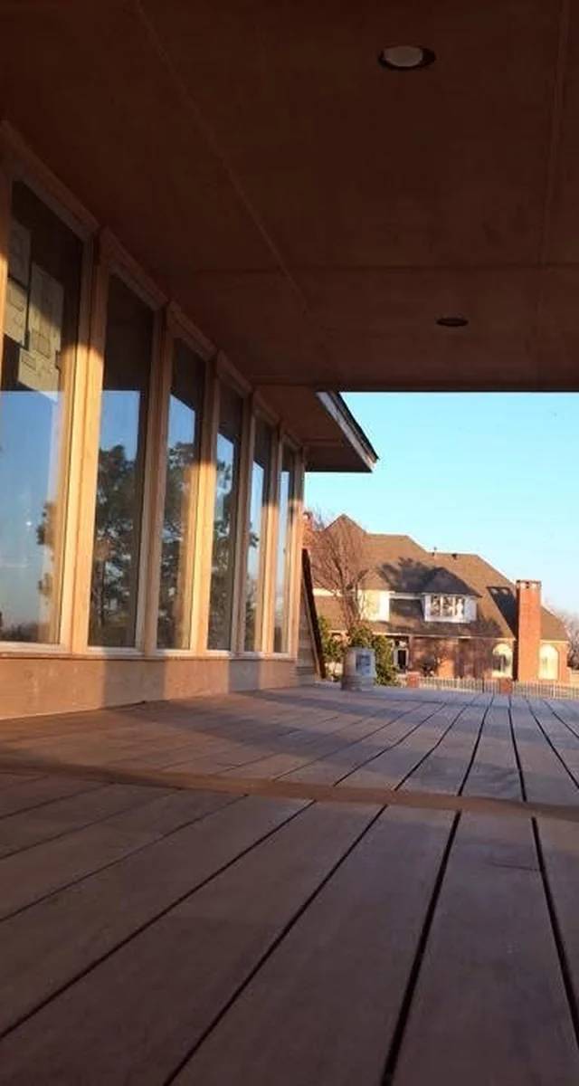 Second-story outdoor living space in Norman by MASB Construction