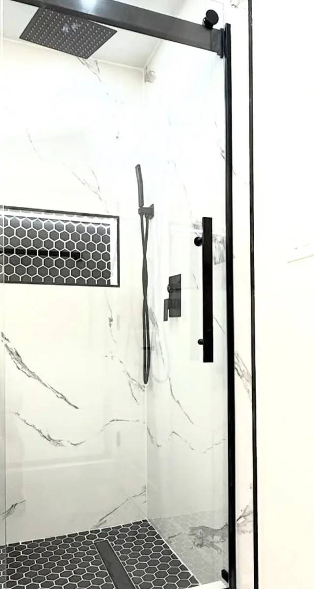 Bathroom vanity and flooring detail in Moore by MASB Construction