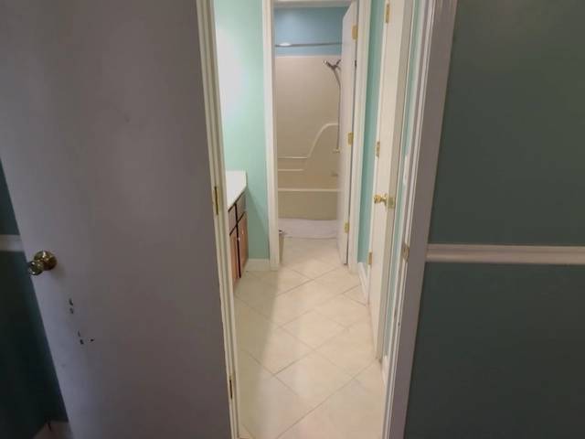 Custom tile work in Bethany bathroom makeover by MASB Construction