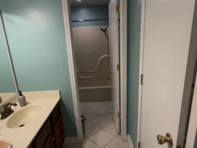 Modern vanity and mirror in Bethany bathroom makeover by MASB Construction