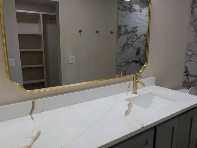 Shower tile installation in Bethany bathroom remodel by MASB Construction