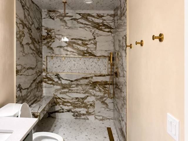 Finished vanity area in Bethany bathroom makeover by MASB Construction