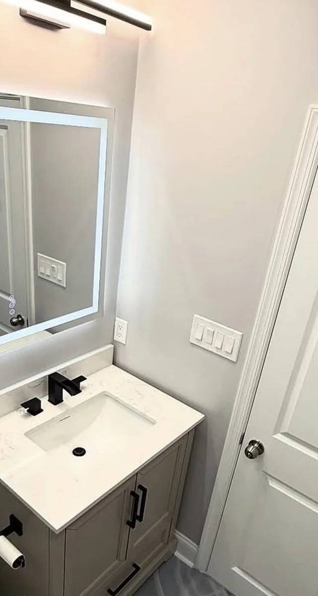 Finished modern bathroom renovation in Edmond by MASB Construction
