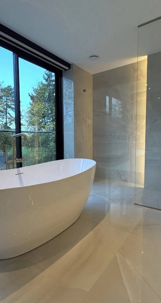 Walk-in shower detail in Norman bathroom remodel by MASB Construction