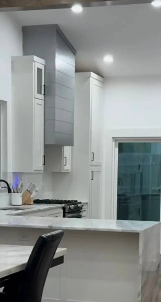 Kitchen lighting and layout improvement in Norman by MASB Construction