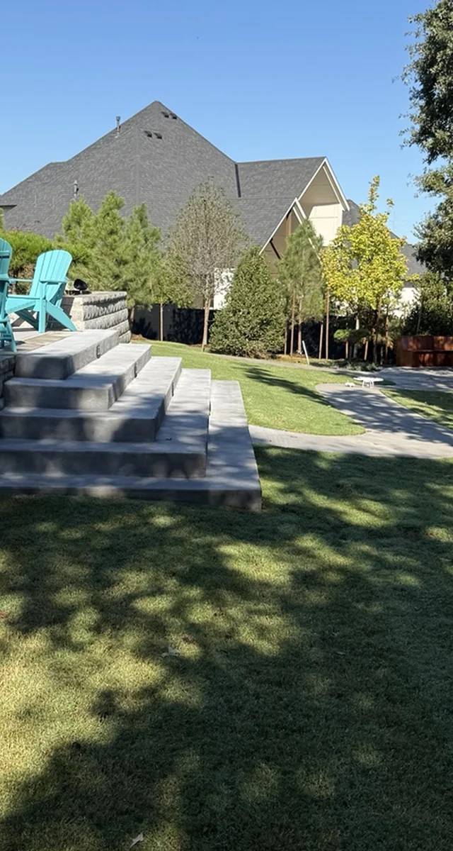 Hardscape remodel surrounding pool area in Edmond by MASB Construction